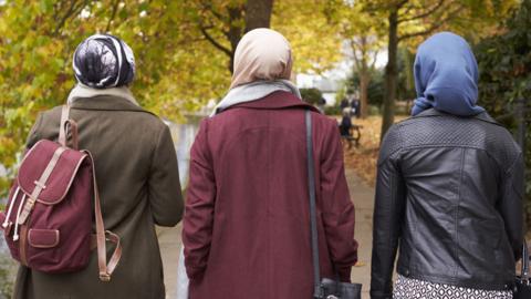 A stock image of three female friends