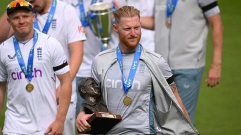 England captain Ben Stokes with the Test series trophy after beating South Africa