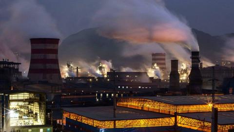 Coal emissions billowing from a steel factory in Hebei, China