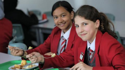 Pupils from Swanlea School, Tower Hamlets, having lunch