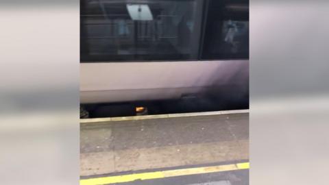 Fire underneath a train at Gatwick Airport