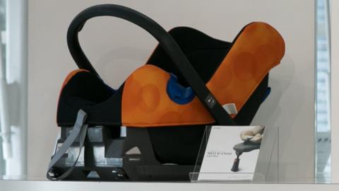 A child safety seat on display at a car showroom in Tokyo, Japan (file photo)