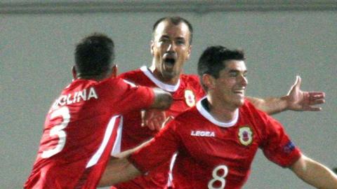 Gibraltar players celebrate