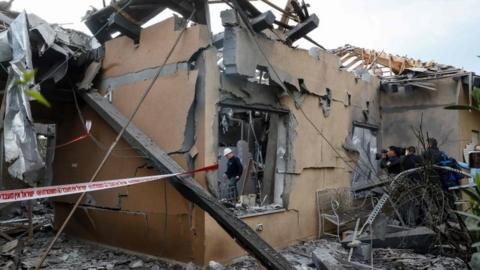 A general view shows a damaged house after it was hit by a rocket in the community of Mishmeret, north of Tel Aviv on 25 March 2019.