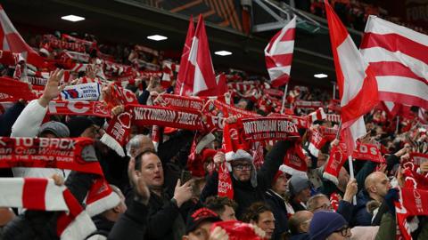 Nottingham Forest supporters hold scarves and flags prior to their Europa League match