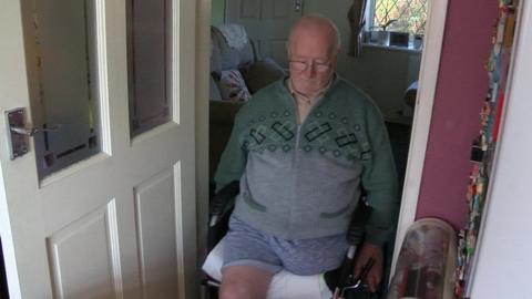 Ernie Moore in wheelchair
