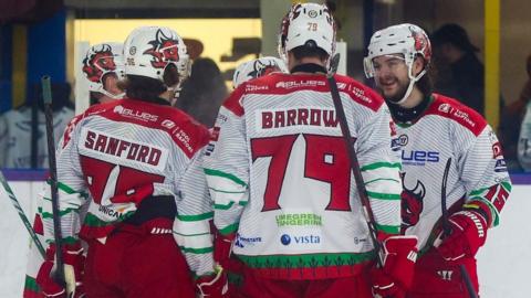 Cardiff Devils players celebrate at Manchester Storm