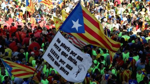 People march during a demonstration celebrating the Catalonia National Day in Barcelona, Spain. 11 September 2017