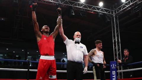 Ramtin Musah at a boxing match