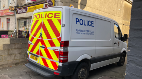 Wiltshire Police forensic van at scene