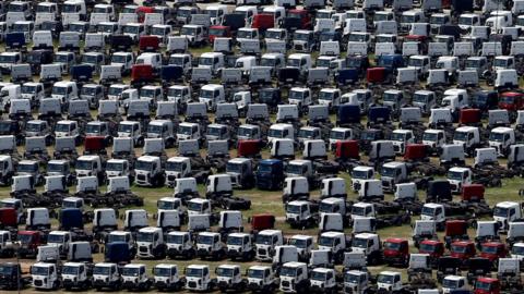 New Ford trucks are seen at a parking lot of the Ford factory in Sao Bernardo do Campo, Brazil, February 12, 2015.