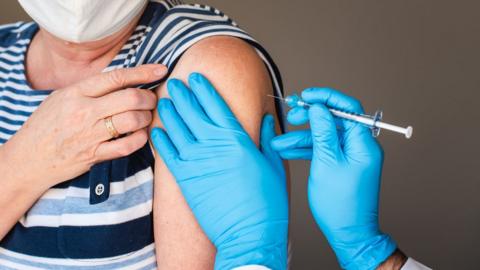 Person being vaccinated