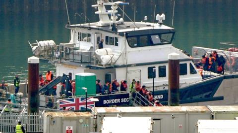 A group of people thought to be migrants are brought in to the Border Security Command compound in Dover, Kent, from a Border Security Command vessel following a small boat incident in the Channel.