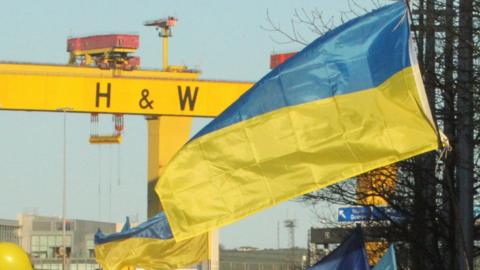 Ukrainian flags at an anti-war protest in Belfast