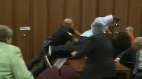 Man leaps at serial killer in courtroom