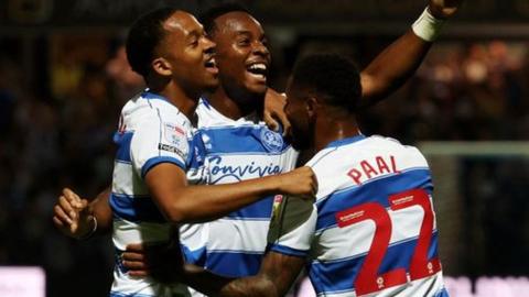 Ethan Laird celebrates with Kenneth Paal and Chris Willock