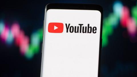 YouTube logo on a phone