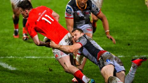 Shane Daly is tackled by Tom Prydie