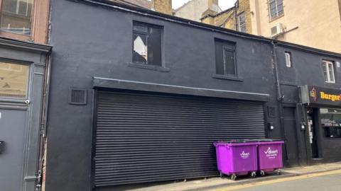 A building painted black in Bradford city centre