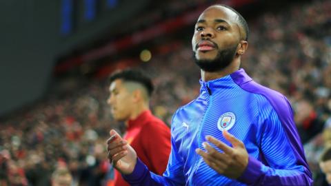 Raheem Sterling walks out at Anfield for Manchester City