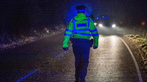 A policeman at the scene