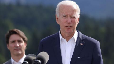 President Joe Biden speaks at the "Global Infrastructure" side event as Canadian Prime Minister Justin Trudeau looks on during the G7 summit at Schloss Elmau on June 26, 2022