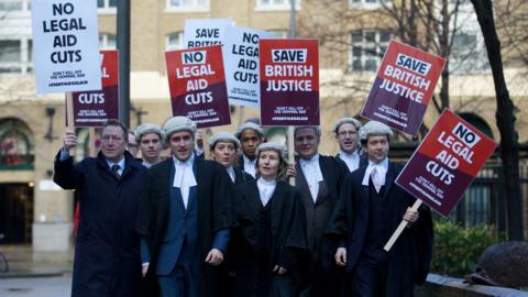 British legal professionals protest against legal cuts