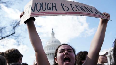 Students participate in a protest against gun violence 21 February 2018 on Capitol Hill in Washington, DC.