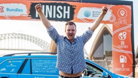 Dutch adventurer Wiebe Wakker finishes his three-year electric car journey from the Netherlands to Australia, in Sydney