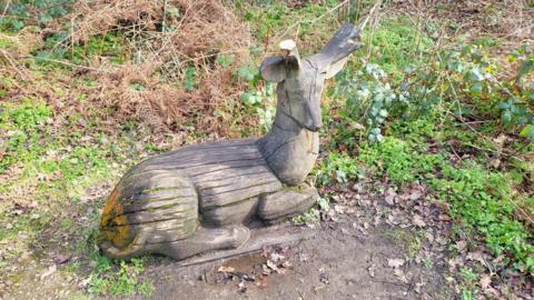 The stag sculpture in Savernake Park, with antlers sawn off