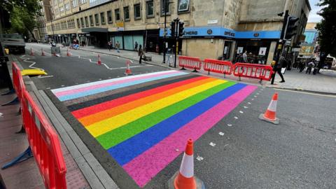 Rainbow crossing painted on the street