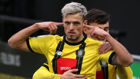 Josh March of Harrogate Town celebrates