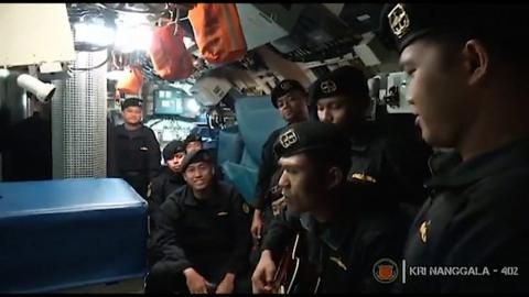 The crew of the sunken Indonesian submarine singing together on board the vessel