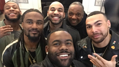 This is a photo of Mark Ingram and five of his team mates form the New Orleans Saints.