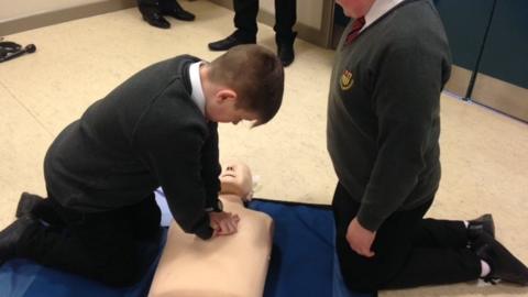 Pupils at Belfast Boys' Model School learning CPR techniques