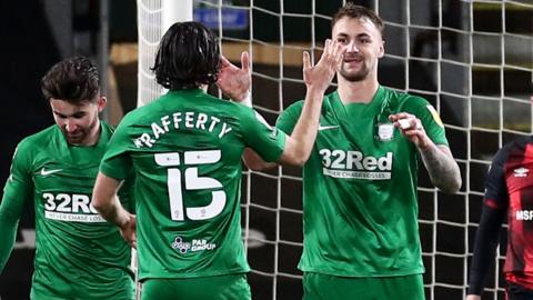 Patrick Bauer celebrates scoring for Preston at Bournemouth