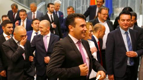 Social Democrat leader Zoran Zaev (C) poses for photo with newly elected ministers at Macedonian parliament in Skopje, June 1, 2017