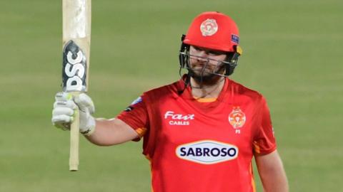 Paul Stirling acknowledges applause after reaching his half century in Karachi