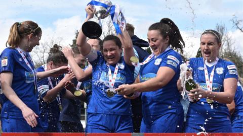 Cardiff City's players celebrate victory over Briton ferry Llansawel