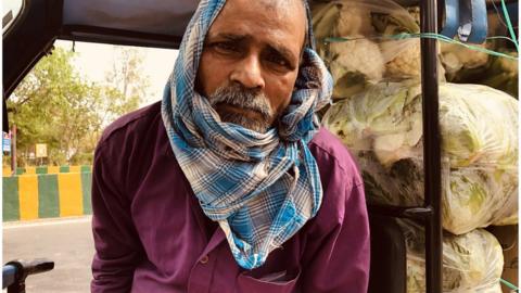 Ramprasad Shah sells vegetables in Noida