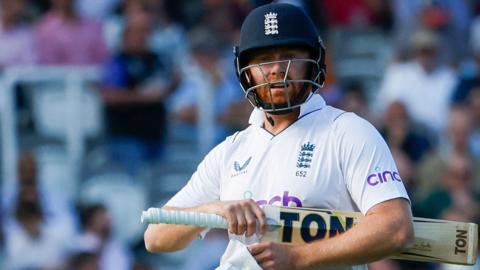 Jonny Bairstow walks off after being dismissed