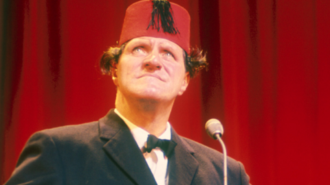 Tommy Cooper on stage