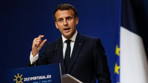 French President Emmanuel Macron attends a press conference at the end of an Informal Meeting of EU Heads of State and Government held at Palacio de Cristal in Porto, Portugal May 8, 2021.