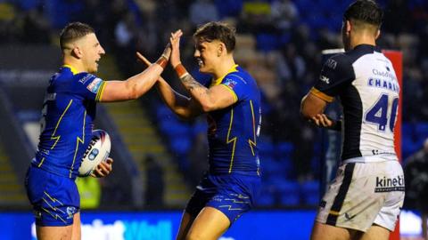 George Williams celebrates scoring a try