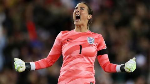 Mary Earps celebrates while playing for England