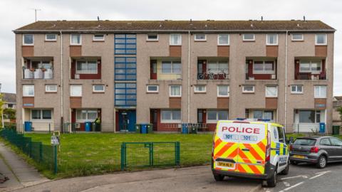 Police outside flats