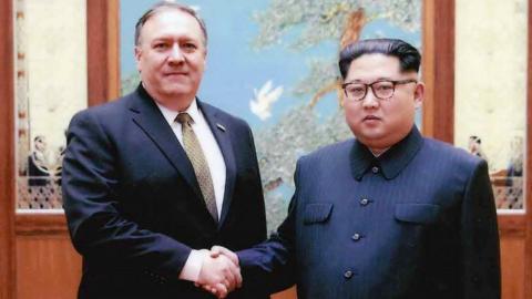 Mike Pompeo (L) shakes hands with North Korean leader Kim Jong-un in Pyongyang, North Korea