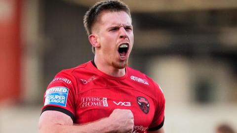 Loghan Lewis in action for Salford Red Devils