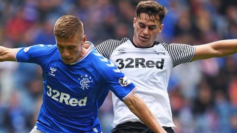 Tom Lawrence playing for Derby (right)