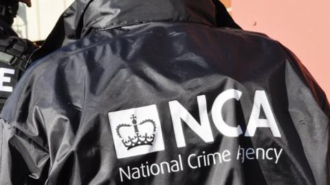 A National Crime Agency officer